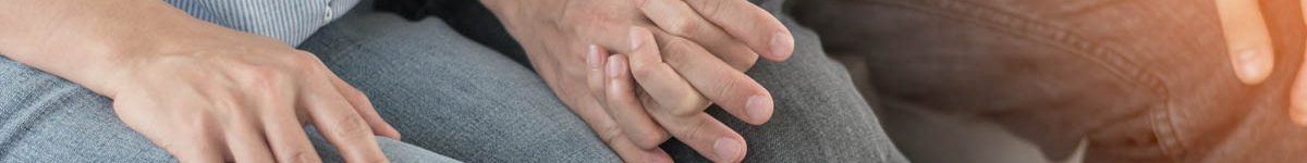 Patient couple consulting with doctor or psychologist on family