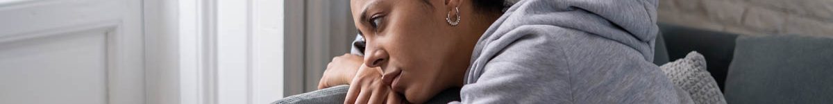 Sad black woman suffering from depression symptoms feeling distr