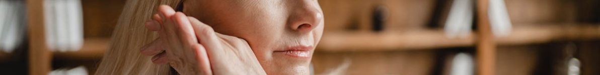 Psychologist appointment. Stressed sad tired exhausted caucasian middle-aged mature businesswoman freelancer relaxing on the couch sofa, thinking about family marriage work problems at work office